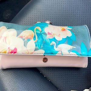 Ted Baker London Woman Wallet Used, with slight Tear on ID section. Many section